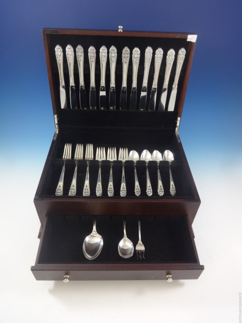 International Sterling Silver Queen's Lace Flatware Set 51 Pieces for 12: International Sterling Silver Queen's Lace Flatware Set 51 Pieces for 12 Enhance your dining experience with the exquisite Queen's Lace Sterling Silver Flatware Set by International Silver. This post-