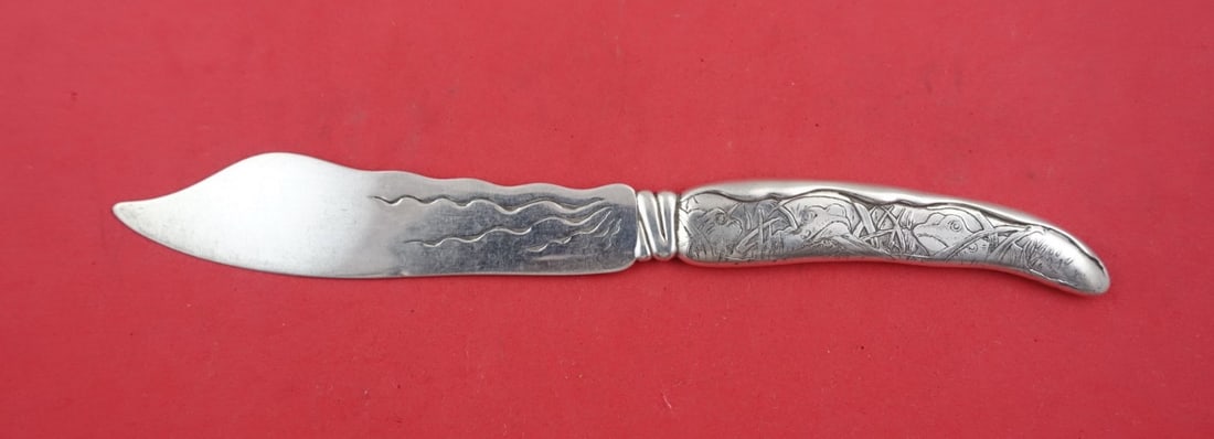 Tiffany & Co. Lap Over Edge Sterling Silver Fish Knife 7 7/8 with Frog Motif: Tiffany & Co. Lap Over Edge Sterling Silver Fish Knife 7 7/8 with Frog Motif This exquisite Lap Over Edge acid-etched fish knife by Tiffany & Co. showcases a magnificent design crafted from sterling s