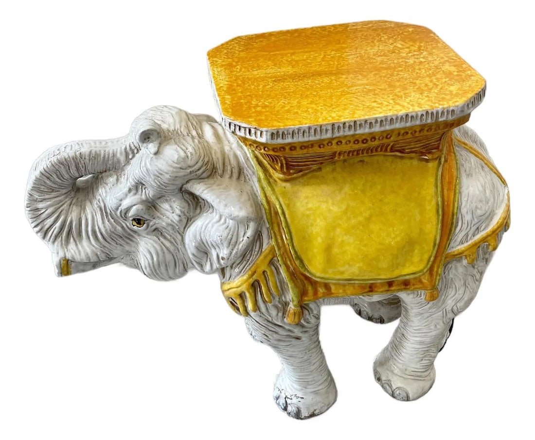 Vintage 1950s Italian Glazed Terracotta Elephant Garden Seat: Vintage 1950s Italian Glazed Terracotta Elephant Garden Seat This delightful Italian Glazed Terracotta Elephant Garden Seat from the 1950s is a charming addition to any garden or patio. Smaller in siz