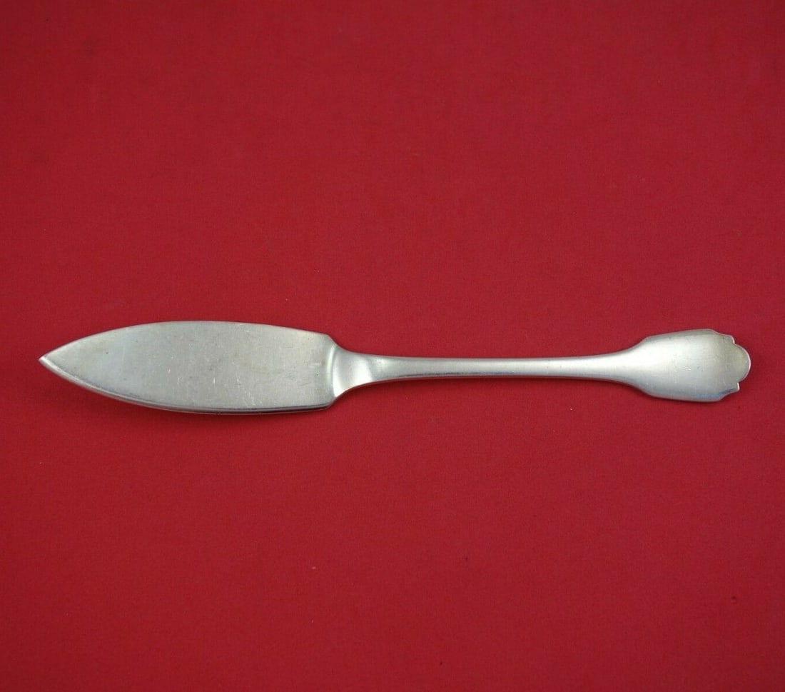 Christofle Sterling Silver Flat Handle Fish Knife 8 1/4 Inch: Christofle Sterling Silver Flat Handle Fish Knife 8 1/4 Inch This exquisite Christofle fish knife features a classic flat handle design, meticulously crafted from high-quality sterling silver. Measuri