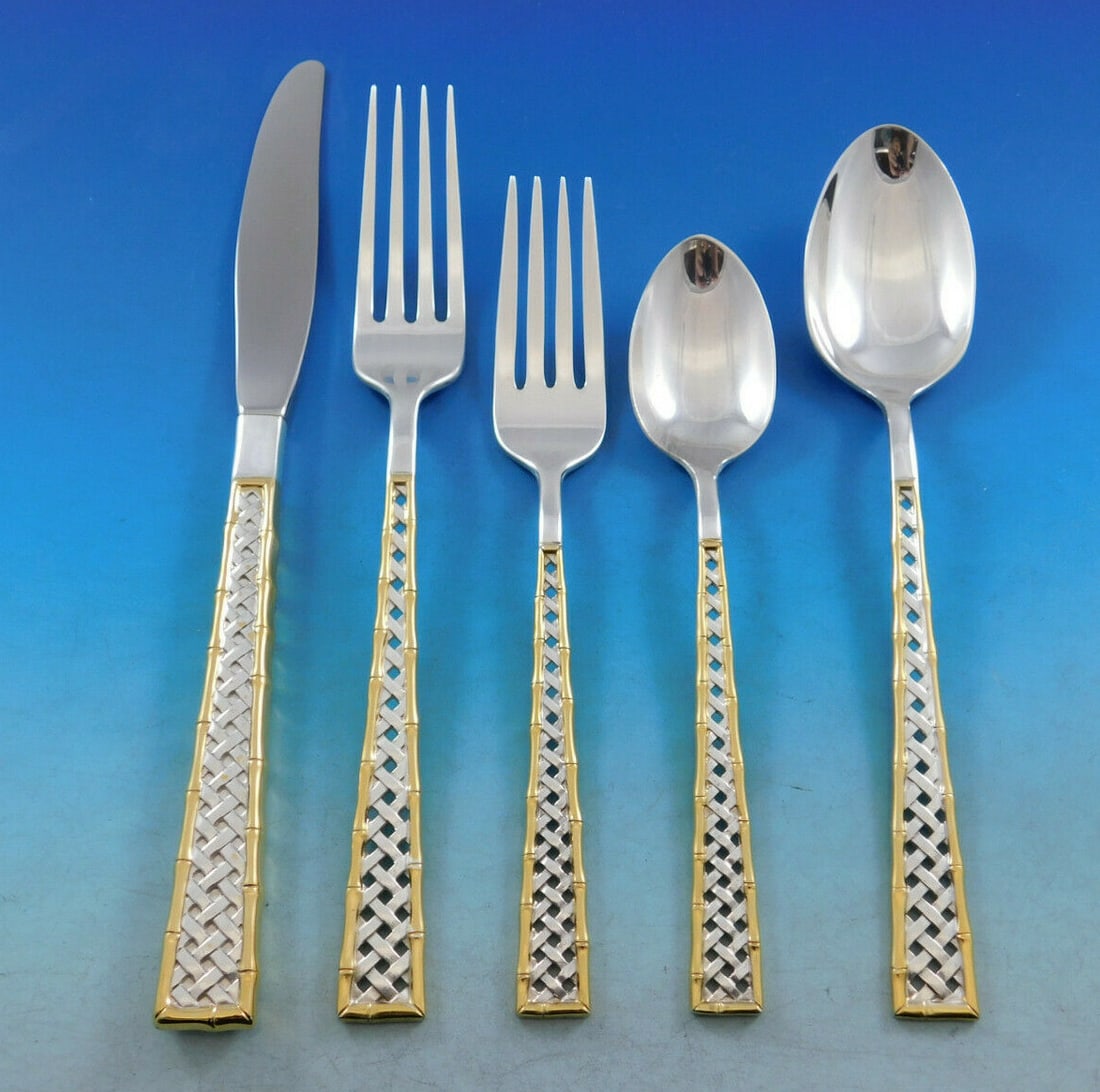 International Silver Golden Tradewinds Flatware Set 45 pcs: International Silver Golden Tradewinds Flatware Set 45 pcs Introducing the Golden Tradewinds Flatware Set by International Sterling, a stunning collection that showcases a unique basket weave design a
