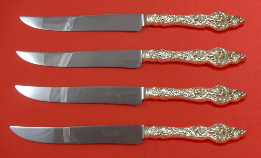 Reed & Barton Les Six Fleurs Sterling Silver Texas Sized Steak Knife Set 4-Piece: Reed & Barton Les Six Fleurs Sterling Silver Texas Sized Steak Knife Set 4-Piece Elevate your dining experience with this exceptional 4-piece steak knife set from Reed & Barton, featuring the exquisit