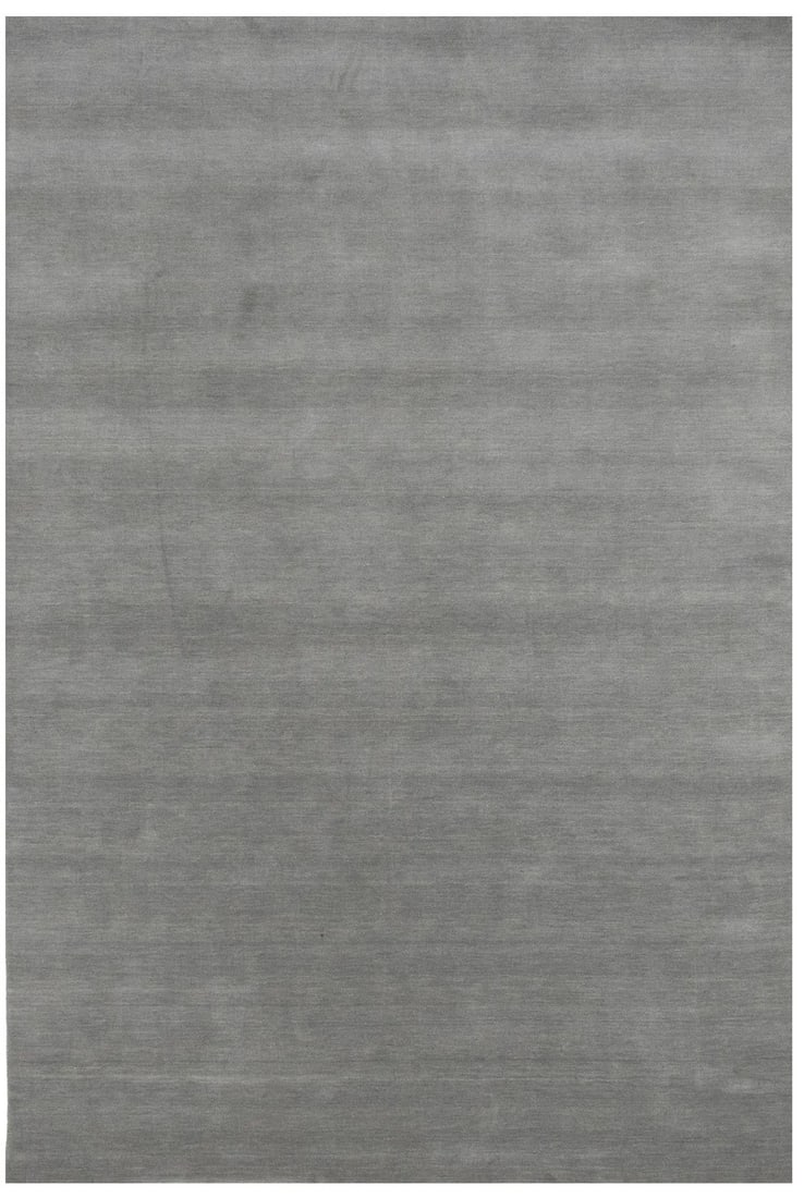 6x9 Modern Hand-Loomed Wool Area Rug in Solid Gray: 6x9 Modern Hand-Loomed Wool Area Rug in Solid Gray This gray solid hand-loomed Gabbeh wool rug is crafted in a modern style, offering a versatile addition to any home decor. Made from quality wool, it