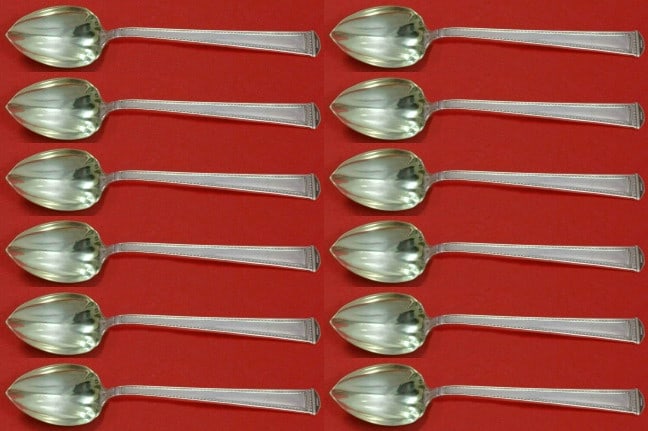 Pantheon International Sterling Silver Grapefruit Spoon Set 12 pcs 6": Pantheon International Sterling Silver Grapefruit Spoon Set 12 pcs 6" Enhance your dining experience with this exquisite set of 12 grapefruit spoons from the Pantheon pattern by International Sterling