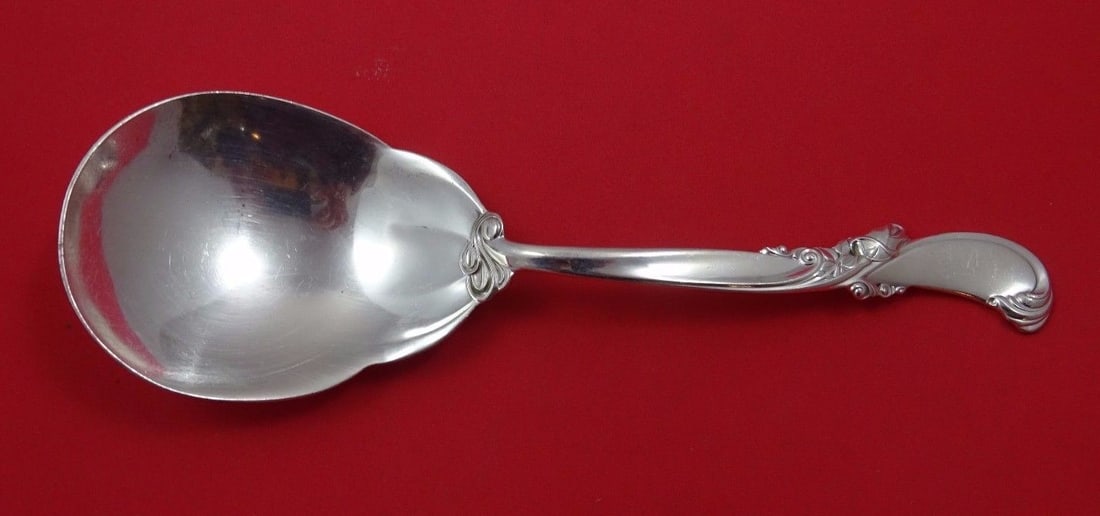 Wallace Sterling Silver Serving Spoon Waltz of Spring 9 1/8": Wallace Sterling Silver Serving Spoon Waltz of Spring 9 1/8" This exquisite serving spoon features the elegant "Waltz of Spring" pattern by Wallace. Crafted from high-quality sterling silver, this ber