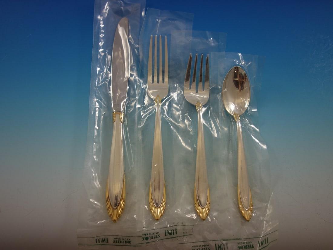 Lunt Soleil Gold Sterling Silver Flatware Set for 12 48 Pieces New: Lunt Soleil Gold Sterling Silver Flatware Set for 12 48 Pieces New Introducing the Soleil Gold Flatware Set by Lunt, a stunning collection crafted from high-quality sterling silver. This elegant set,