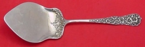 Dominick & Haff Rococo Sterling Silver Waffle Server 9.5 inches: Dominick & Haff Rococo Sterling Silver Waffle Server 9.5 inches This exquisite waffle server is crafted in sterling silver by Dominick & Haff, showcasing the elegant Rococo pattern. Measuring 9 1/2 in