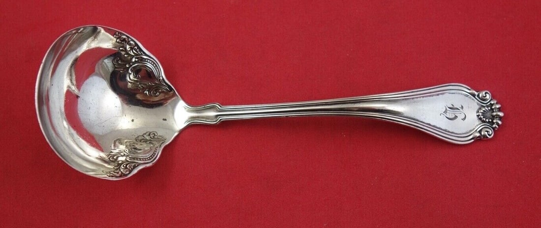 Century Sterling Silver Gravy Ladle by Dominick & Haff 6 1/4": Century Sterling Silver Gravy Ladle by Dominick & Haff 6 1/4" This exquisite gravy ladle is crafted from sterling silver by Dominick & Haff, featuring a beautifully designed bowl. The piece is part of
