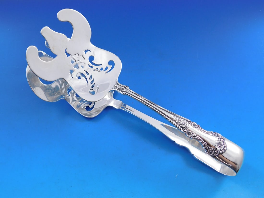 Gorham Cambridge Sterling Silver 9 Inch Pierced Asparagus Serving Tong: Gorham Cambridge Sterling Silver 9 Inch Pierced Asparagus Serving Tong This exquisite Cambridge by Gorham asparagus serving tong is crafted from high-quality sterling silver, showcasing a beautiful pi