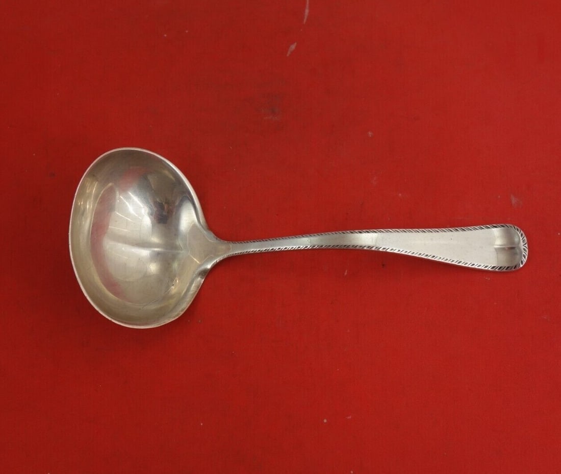 Reed & Barton Wakefield Sterling Silver Gravy Ladle 6.5 Inch: Reed & Barton Wakefield Sterling Silver Gravy Ladle 6.5 Inch This exquisite gravy ladle, measuring 6 1/2 inches, is crafted from sterling silver and features the elegant Wakefield pattern by Reed and