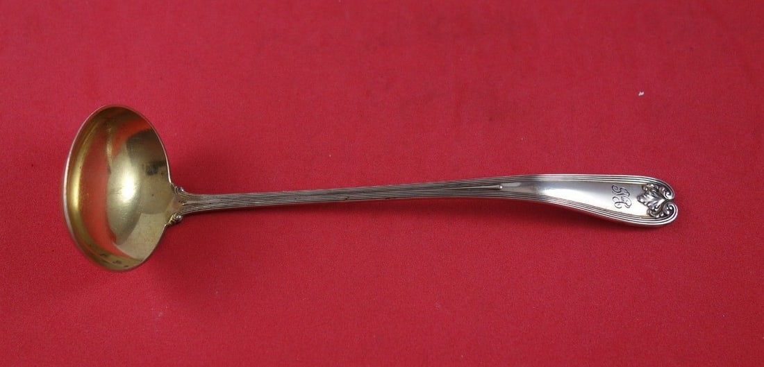 Tiffany & Co Colonial Sterling Silver Sauce Ladle Gold Washed 7.25": Tiffany & Co Colonial Sterling Silver Sauce Ladle Gold Washed 7.25" This elegant sauce ladle from Tiffany & Co. showcases the exquisite Colonial pattern, crafted from high-quality sterling silver with