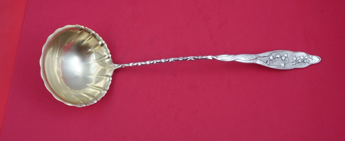 Whiting Lily of the Valley Sterling Silver Soup Ladle 13.25" Twisted Handle: Whiting Lily of the Valley Sterling Silver Soup Ladle 13.25" Twisted Handle This exquisite soup ladle from the 'Lily of the Valley' pattern by Whiting is a true testament to the artistry of sterling s