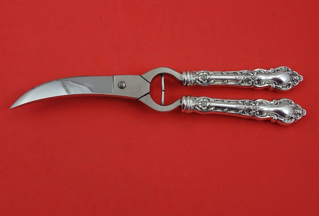 Wallace Sterling Silver Meadow Rose Lobster Shears 10 1/4": Wallace Sterling Silver Meadow Rose Lobster Shears 10 1/4" Introducing the exquisite Meadow Rose Lobster Shears by Wallace, crafted in high-quality sterling silver. This elegant piece measures 10 1/4"