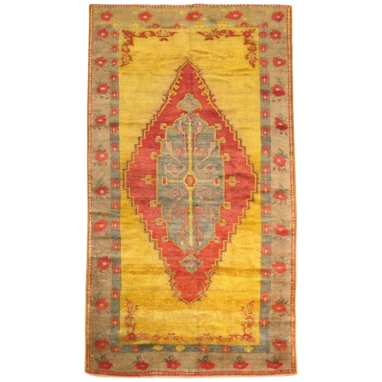 Zabihi Collection 1920 Yellow Turkish Hand-Knotted Wool Rug: Zabihi Collection 1920 Yellow Turkish Hand-Knotted Wool Rug Discover the exquisite craftsmanship of this Zabihi Collection Yellow Turkish Gallery Rug, a stunning piece that blends romance and history.
