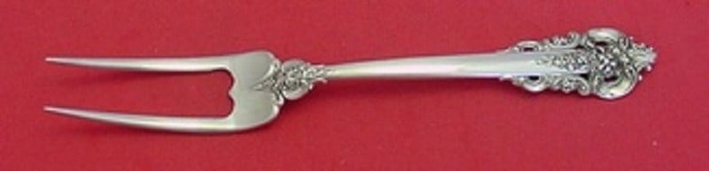 Grande Baroque Sterling Silver Serving Fork 7.5" by Wallace: Grande Baroque Sterling Silver Serving Fork 7.5" by Wallace This exquisite serving fork is a custom-made piece from the renowned Grande Baroque pattern by Wallace. Crafted from sterling silver, it mea