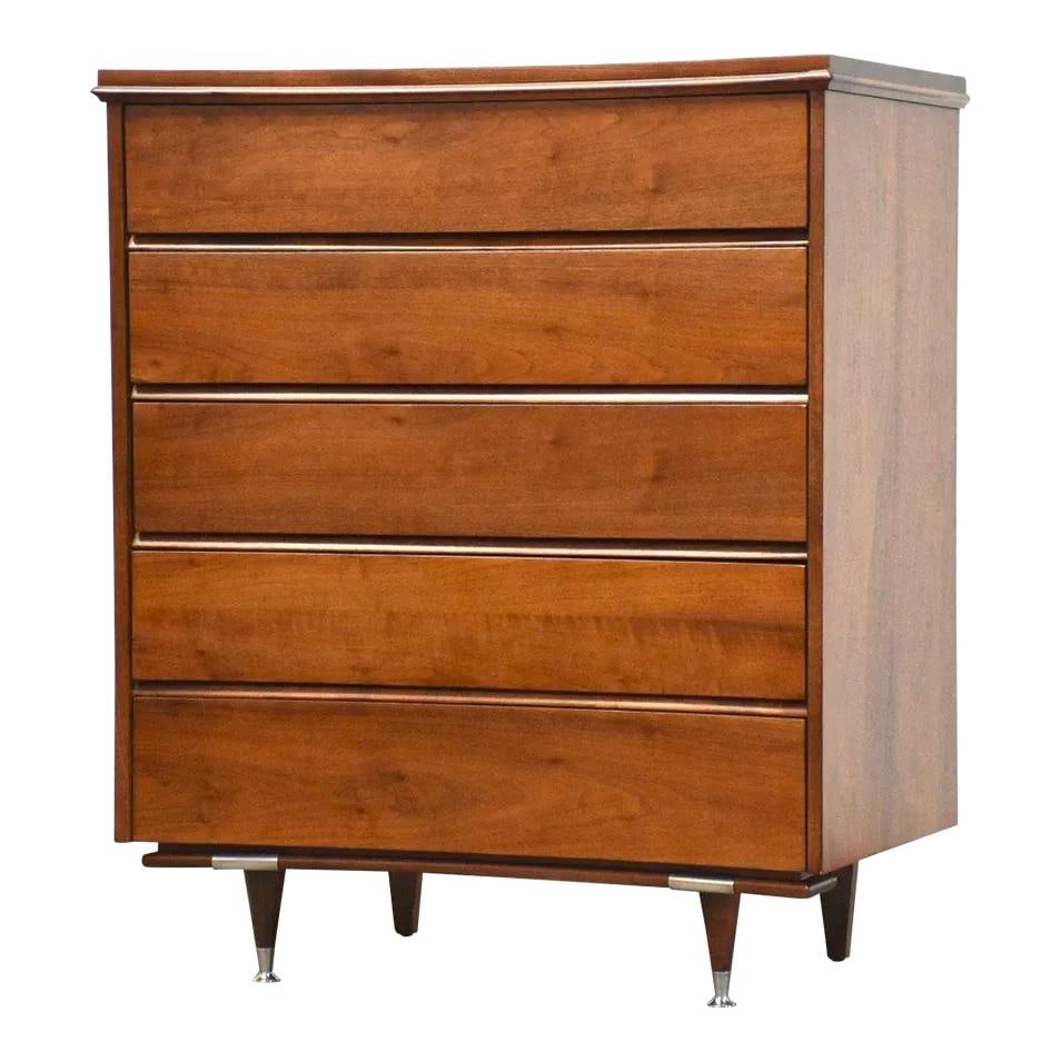 Mid Century Walnut Tall Dresser with Curved Front and Steel Accents: Mid Century Walnut Tall Dresser with Curved Front and Steel Accents This mid-century modern tall dresser showcases a stunning walnut finish with a sleek, curved front and stylish steel accents. Profes