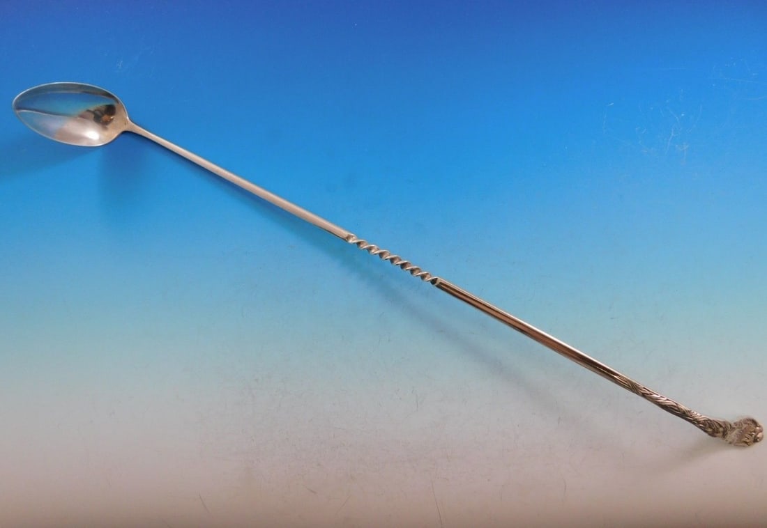Tiffany & Co Chrysanthemum Sterling Silver Claret Ladle 15 3/4" with Twist Handle: Tiffany & Co Chrysanthemum Sterling Silver Claret Ladle 15 3/4" with Twist Handle This exquisite claret ladle from Tiffany & Co. is crafted from sterling silver and measures 15 3/4". Designed in the i