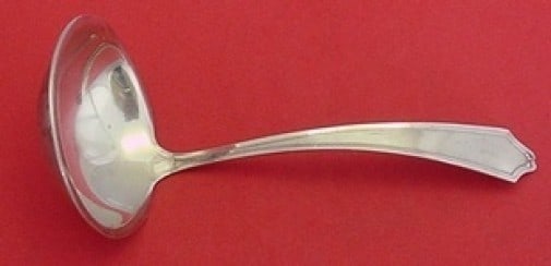 International Sterling Silver Minuet Gravy Ladle 6 3/8": International Sterling Silver Minuet Gravy Ladle 6 3/8" This exquisite gravy ladle features the elegant Minuet pattern by International Sterling. Crafted from high-quality sterling silver, this ladle