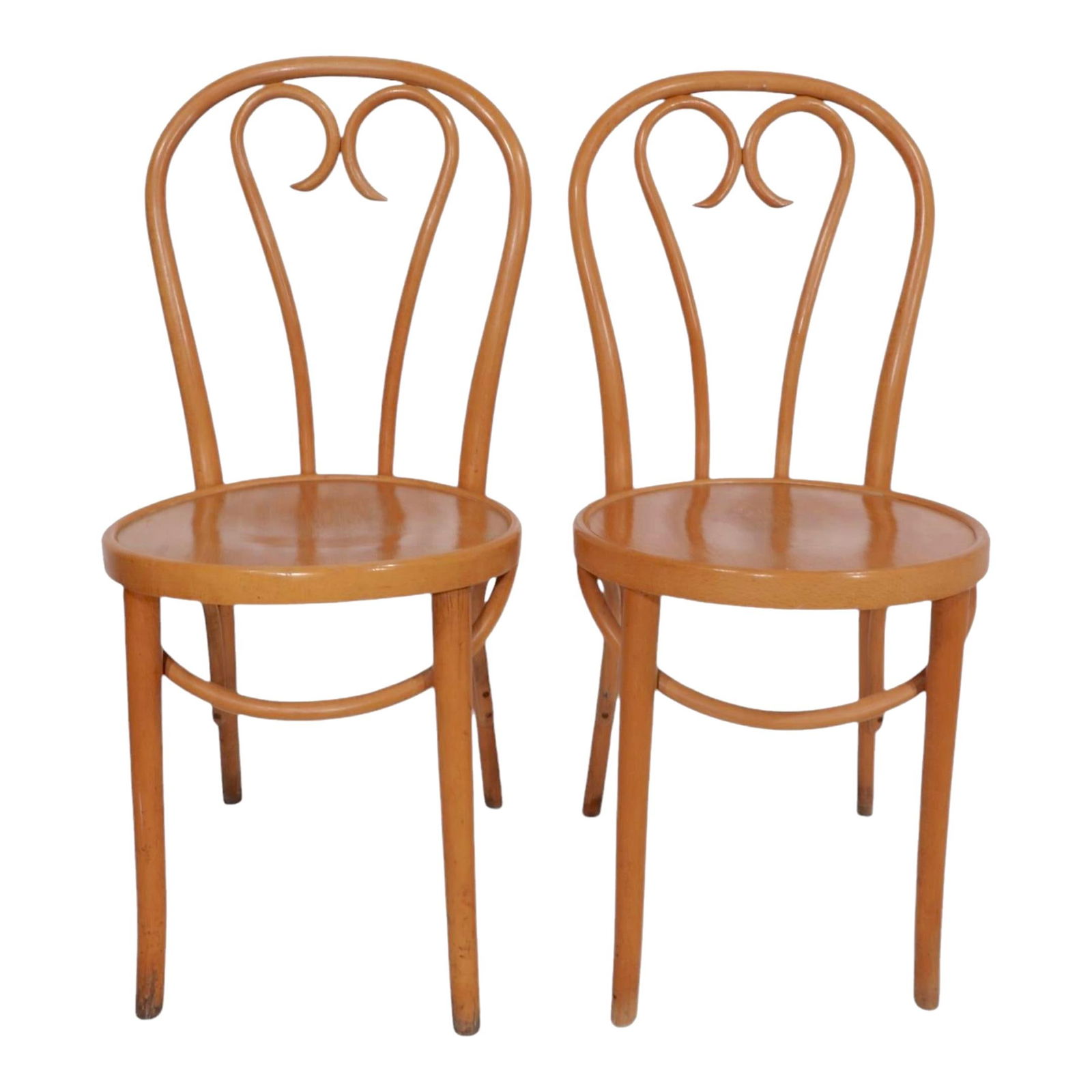 Pair of Bentwood Bistro Dining Chairs After Thonet Romania 1970s: Pair of Bentwood Bistro Dining Chairs After Thonet Romania 1970s This pair of bentwood dining chairs embodies the elegant Vienna Secessionist style, reminiscent of Thonet craftsmanship and made in Rom