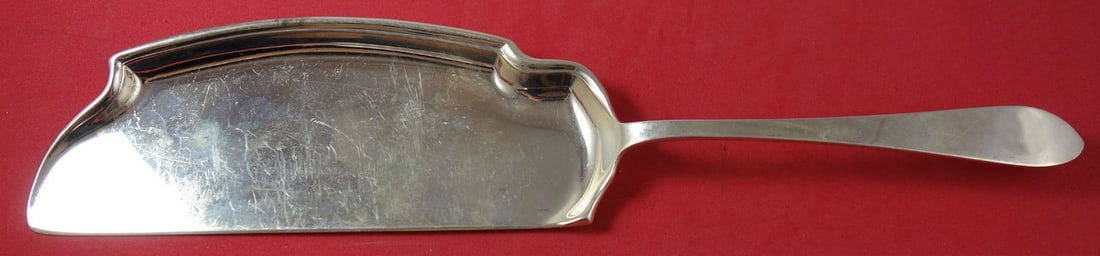 Tiffany & Co. Faneuil Sterling Silver Crumber 13": Tiffany & Co. Faneuil Sterling Silver Crumber 13" This exquisite crumber, measuring 13 inches, is crafted from high-quality sterling silver and showcases the elegant Faneuil pattern by Tiffany & Co. P