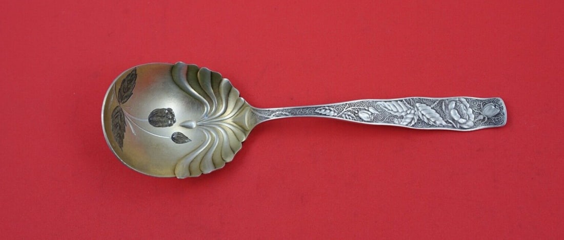 Towle Orchids Sterling Silver Preserve Spoon Gold Washed 7 1/8": Towle Orchids Sterling Silver Preserve Spoon Gold Washed 7 1/8" This exquisite serving spoon from the Orchids pattern by Towle is crafted from high-quality sterling silver. Featuring a beautiful brite