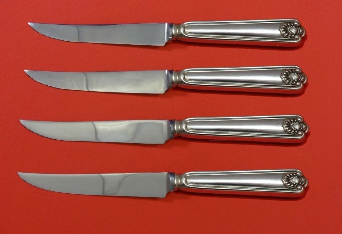 Frank Smith Fiddle Shell Sterling Silver Steak Knife Set 4pc 8.5 inch: Frank Smith Fiddle Shell Sterling Silver Steak Knife Set 4pc 8.5 inch This exquisite 4-piece steak knife set features the elegant Fiddle Shell pattern by Frank Smith. Each knife is crafted with a ster