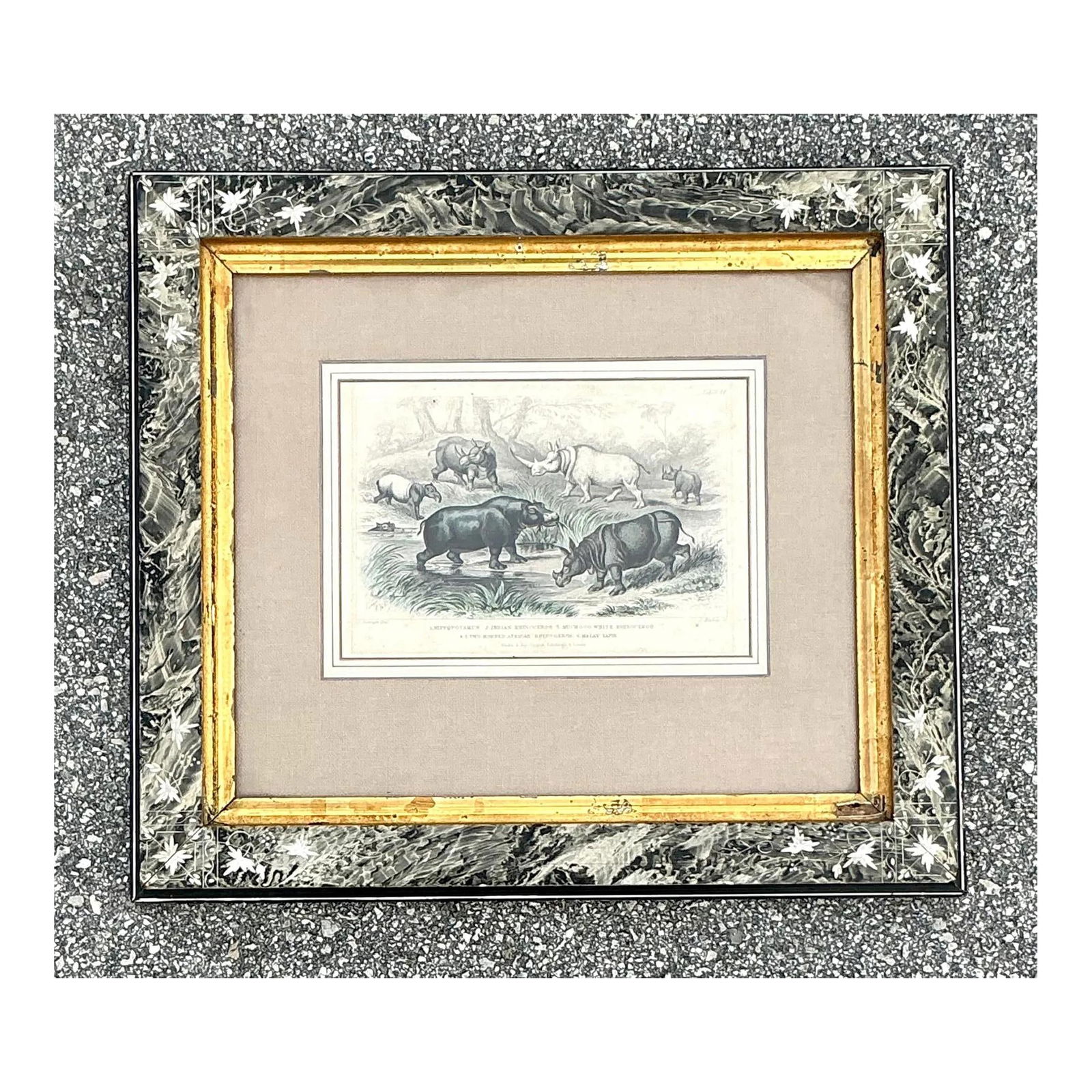 Vintage Boho Rhino Engraving in Floral Carved Frame: Vintage Boho Rhino Engraving in Floral Carved Frame This vintage boho rhino engraving features a captivating scene of rhinoceroses set within a beautifully detailed carved frame. The intricate black-a