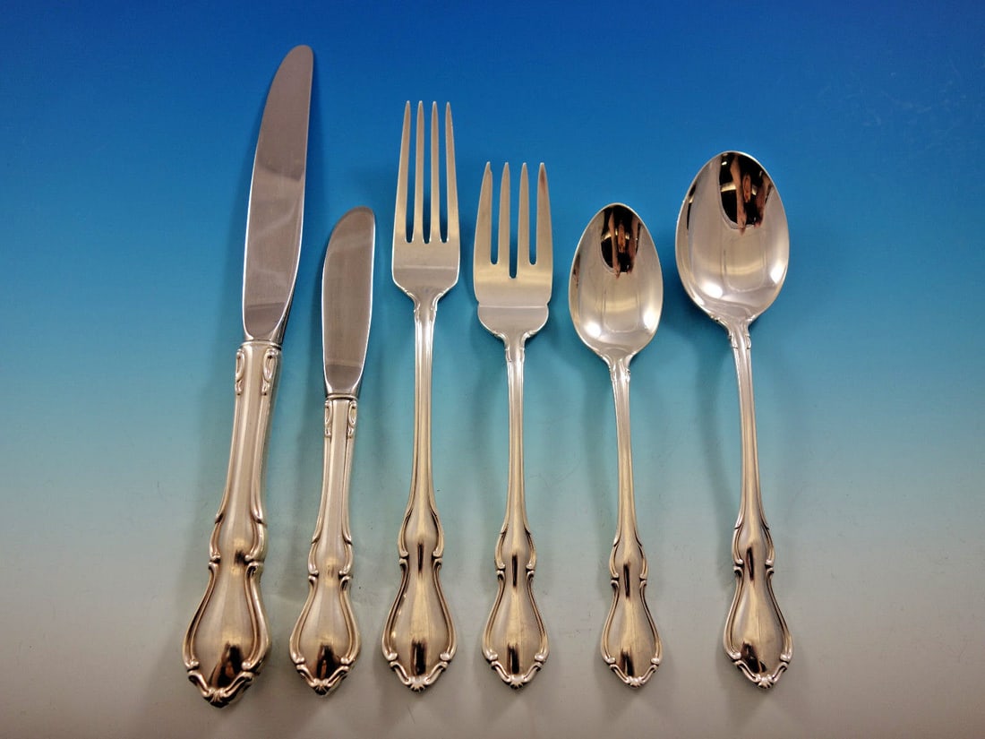 Reed & Barton Hampton Court Sterling Silver Flatware Set 118 pc Service for 18: Reed & Barton Hampton Court Sterling Silver Flatware Set 118 pc Service for 18 Enhance your dining experience with the Hampton Court Sterling Silver Flatware Set by Reed & Barton. This exquisite post-