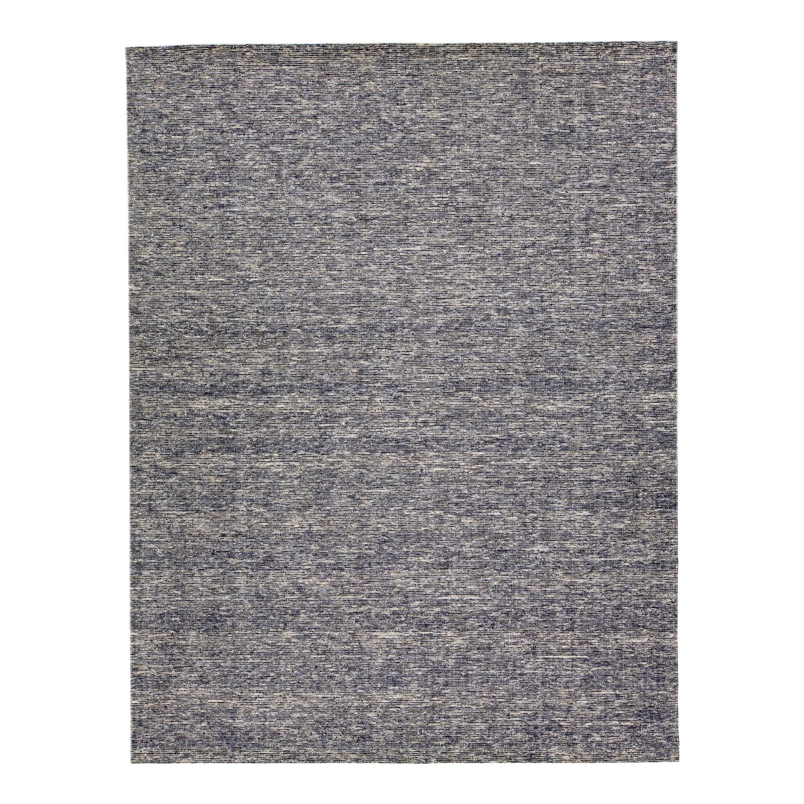 Handmade Indian Wool Rug Blue 9'3" x 11'11": Handmade Indian Wool Rug Blue 9'3" x 11'11" This stunning handmade rug features a captivating blue field with an intricate all-over design. Crafted from a blend of bamboo, silk, and wool, this rug not