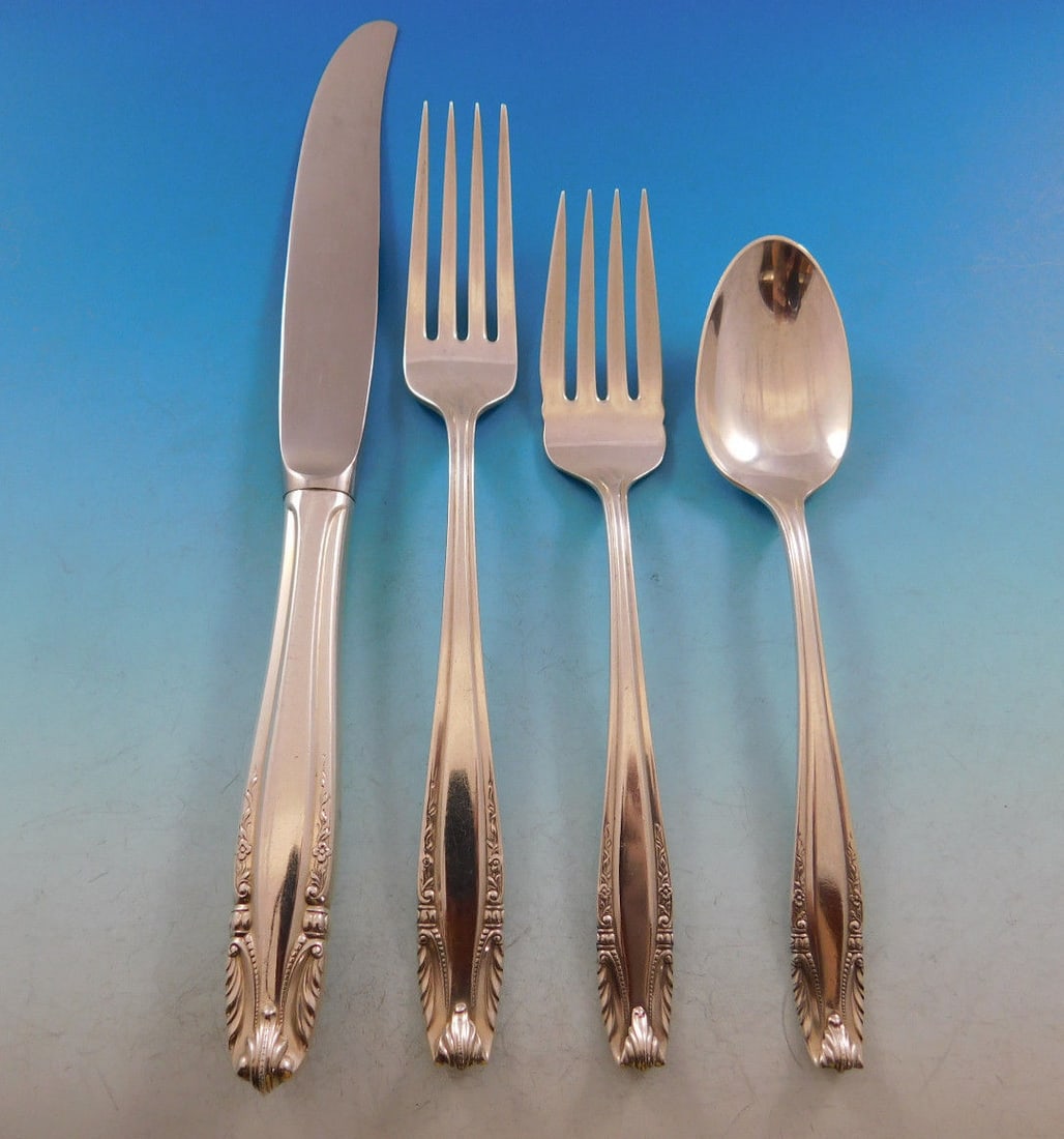 Wallace Stradivari Sterling Silver Flatware Set for 8 with 32 Pieces: Wallace Stradivari Sterling Silver Flatware Set for 8 with 32 Pieces Experience the elegance of the Stradivari pattern by Wallace, a stunning sterling silver flatware set that serves 8. This 32-piece