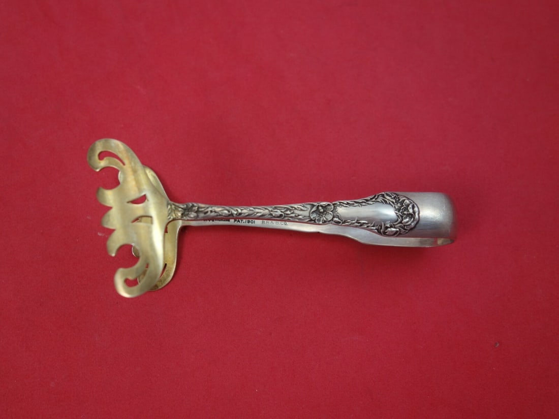 Gorham Marguerite Sterling Silver Asparagus Tong Goldwash 4 1/8": Gorham Marguerite Sterling Silver Asparagus Tong Goldwash 4 1/8" This exquisite individual asparagus tong is part of the Marguerite pattern by Gorham, crafted from sterling silver with a luxurious gol