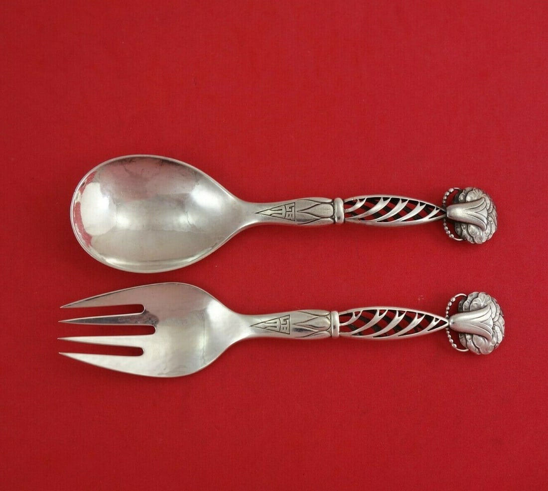 Georg Jensen Ornamental #83 Sterling Silver Salad Serving Set 2pc 7.5in: Georg Jensen Ornamental #83 Sterling Silver Salad Serving Set 2pc 7.5in Enhance your dining experience with this exquisite Ornamental #83 Salad Serving Set by Georg Jensen. Crafted from high-quality s