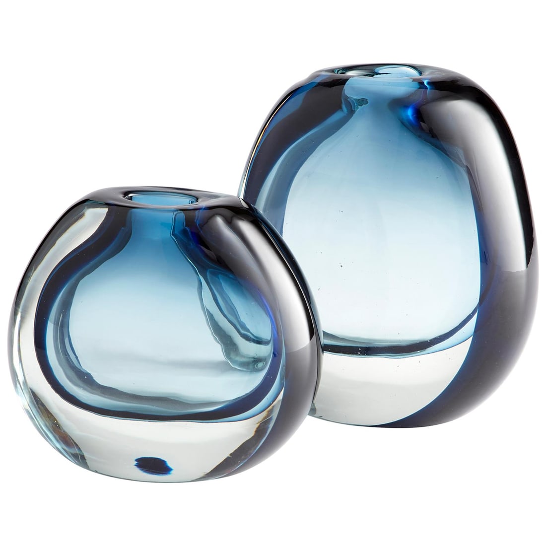 Cyan Jacinta Contemporary Ceramic Glass Vase in Blue Clear: Cyan Jacinta Contemporary Ceramic Glass Vase in Blue Clear Enhance your spring decor with the stylish Jacinta Vase, a stunning piece from the Cyan collection. This contemporary-style vase features a b