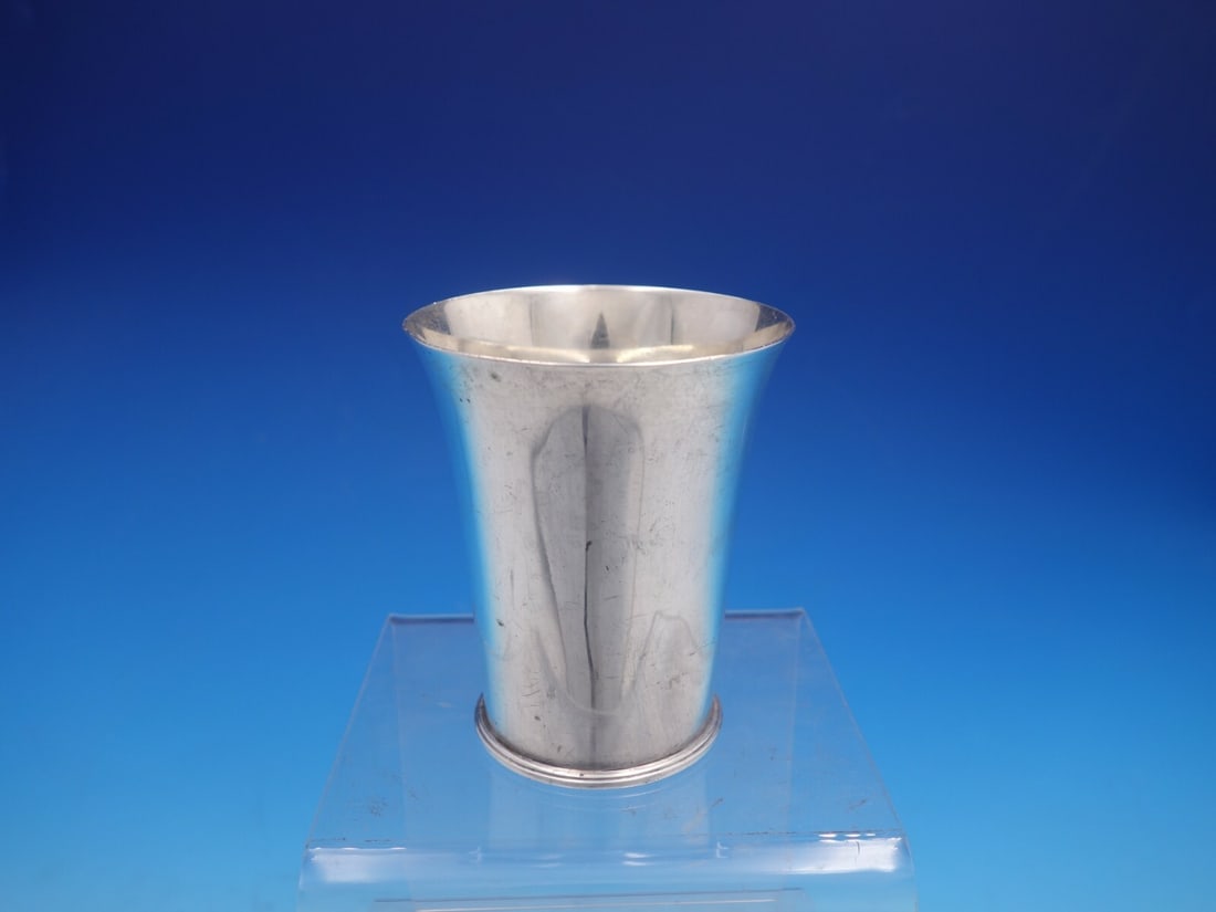 Georg Jensen Number 671B Sterling Silver Cup with Inscription: Georg Jensen Number 671B Sterling Silver Cup with Inscription This exquisite Georg Jensen sterling silver cup, model number 671B, hails from the early to mid-20th century (1900-1940). The cup features