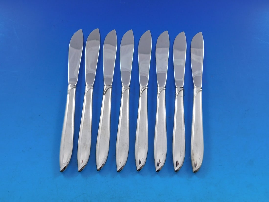 Set of 8 International Silver Rhythm Butter Spreaders Sterling Silver 6 1/4": Set of 8 International Silver Rhythm Butter Spreaders Sterling Silver 6 1/4" Enhance your dining experience with this elegant set of 8 butter spreaders from the Silver Rhythm pattern by International