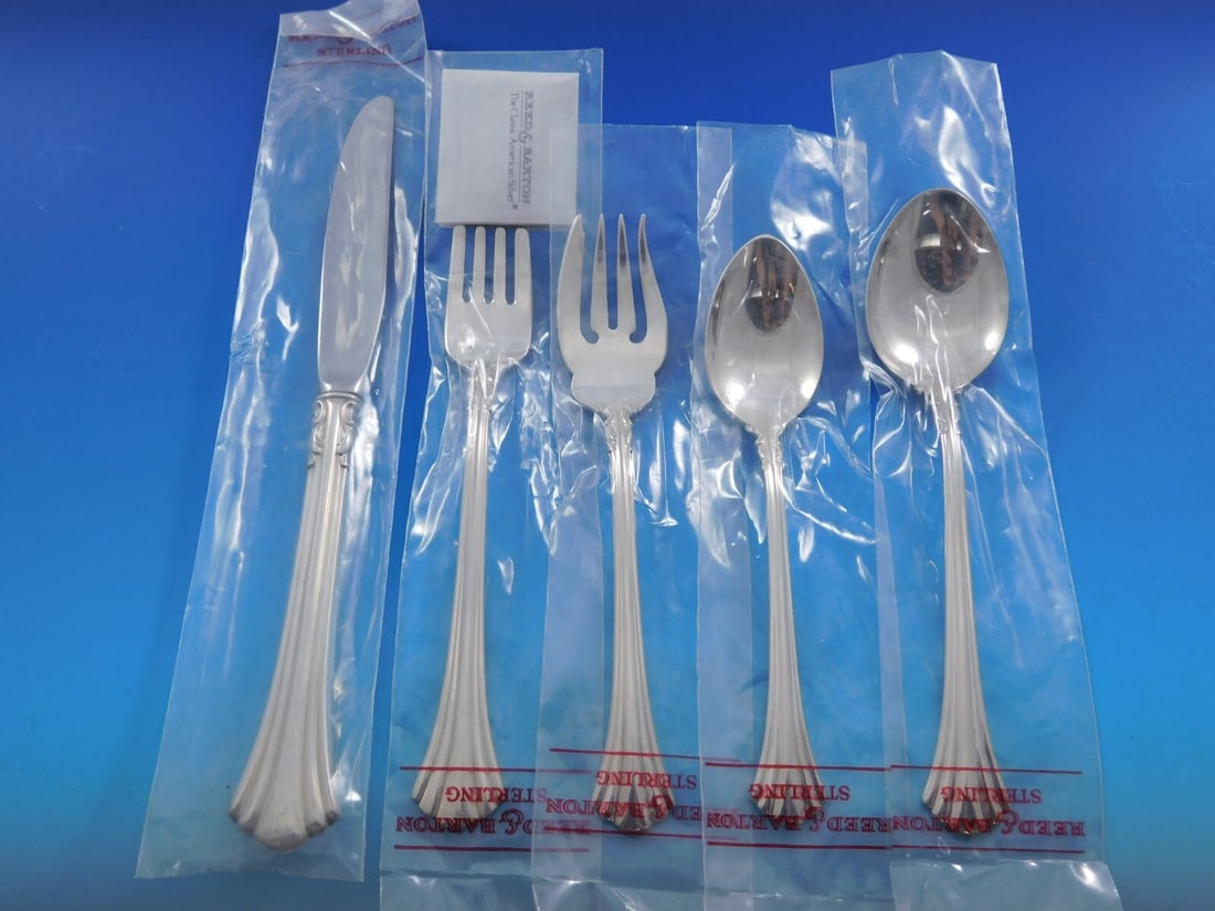 Reed & Barton Eighteenth Century Sterling Silver Flatware Set 67 pcs Unused: Reed & Barton Eighteenth Century Sterling Silver Flatware Set 67 pcs Unused Experience the elegance of the Eighteenth Century flatware set by Reed & Barton. This exquisite collection features a total