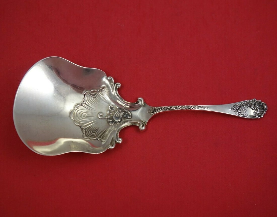 Shiebler Maintenon Sterling Silver Cracker Scoop 8 1/4": Shiebler Maintenon Sterling Silver Cracker Scoop 8 1/4" This exquisite cracker scoop, crafted from sterling silver, features a beautiful design on the bowl and is part of the Maintenon pattern by Shie