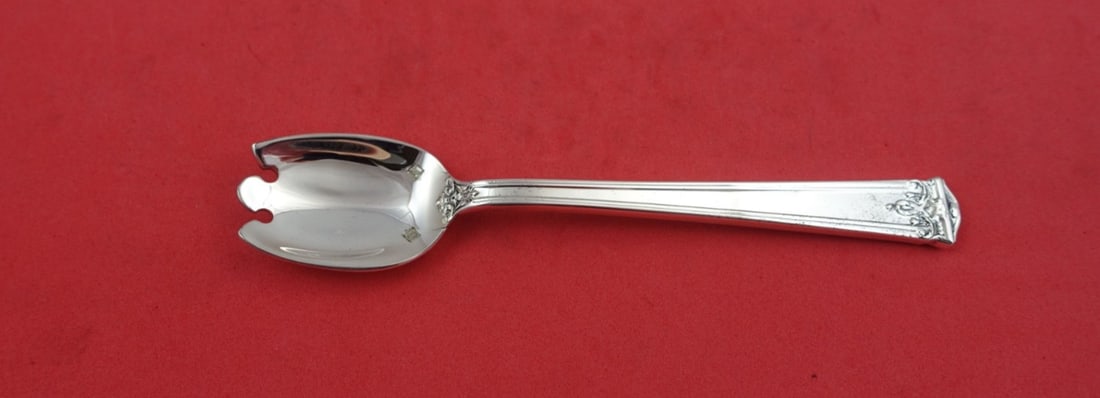 Tuttle Trianon Sterling Silver Ice Cream Fork 5 3/8": Tuttle Trianon Sterling Silver Ice Cream Fork 5 3/8" Discover the elegance of the Trianon by Tuttle Sterling Silver Ice Cream Fork, a timeless piece that enhances any dining experience. This exquisite