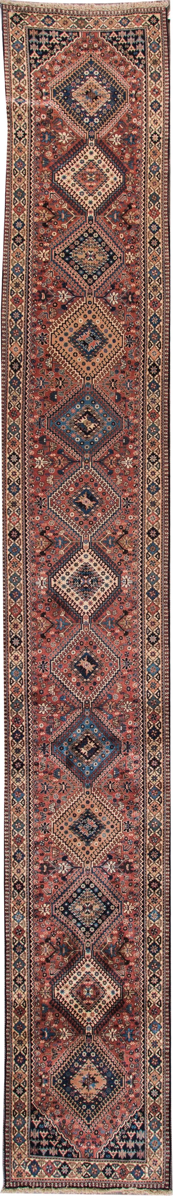 Antique Bakhtiari Handmade Geometric Wool Runner 2'8 x 18'9 Red: Antique Bakhtiari Handmade Geometric Wool Runner 2'8 x 18'9 Red Discover the charm of this exquisite Antique Bakhtiari Handmade Geometric Red Wool Runner. This stunning hand-knotted vintage piece feat
