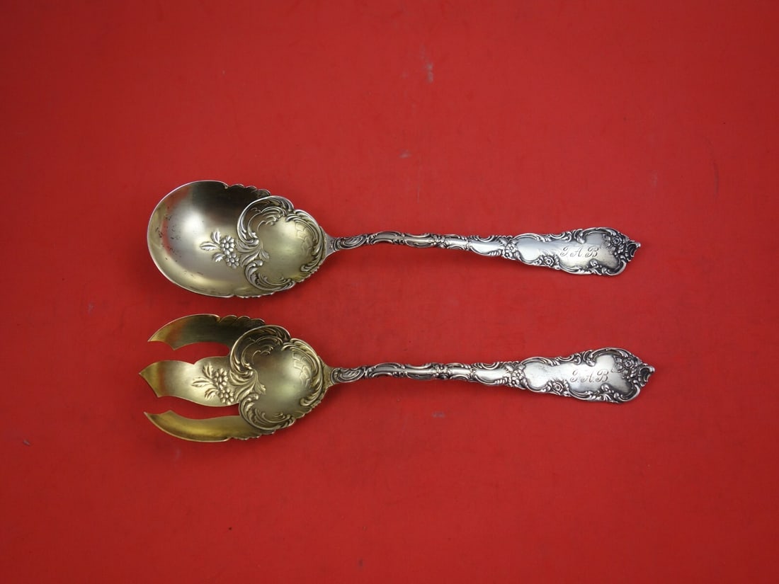Mauser-Wendell Junior Rococo Sterling Silver Salad Serving Set 2pc Goldwashed: Mauser-Wendell Junior Rococo Sterling Silver Salad Serving Set 2pc Goldwashed Elevate your dining experience with this exquisite 2-piece salad serving set in the Junior Rococo pattern by Mauser-Wendel