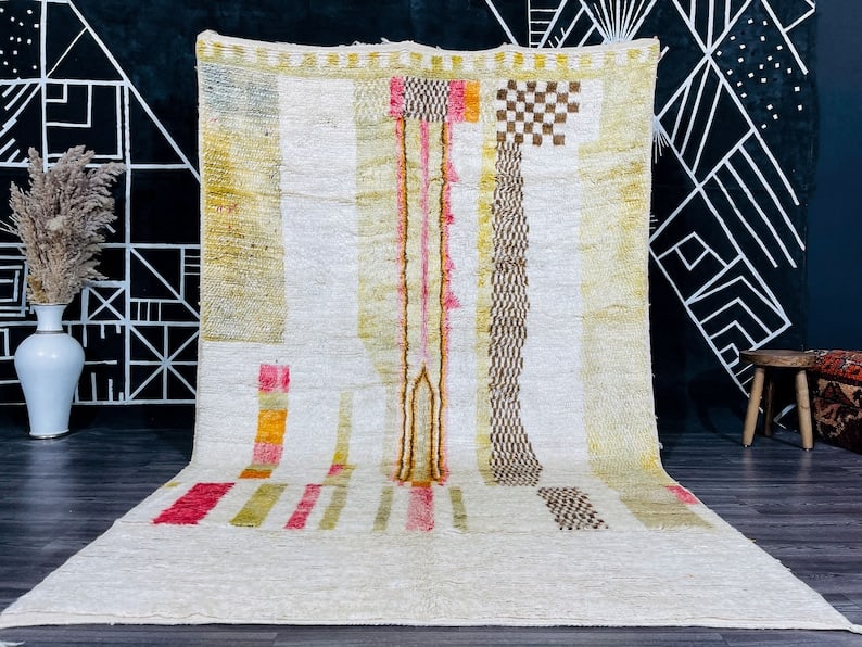 Authentic Handwoven Moroccan Soft Rug 100% Sheep Wool 10 x 5 Feet: Authentic Handwoven Moroccan Soft Rug 100% Sheep Wool 10 x 5 Feet Transform your space with this stunning authentic soft rug, handwoven by local Berber women weavers in the Atlas Mountains of Morocco.