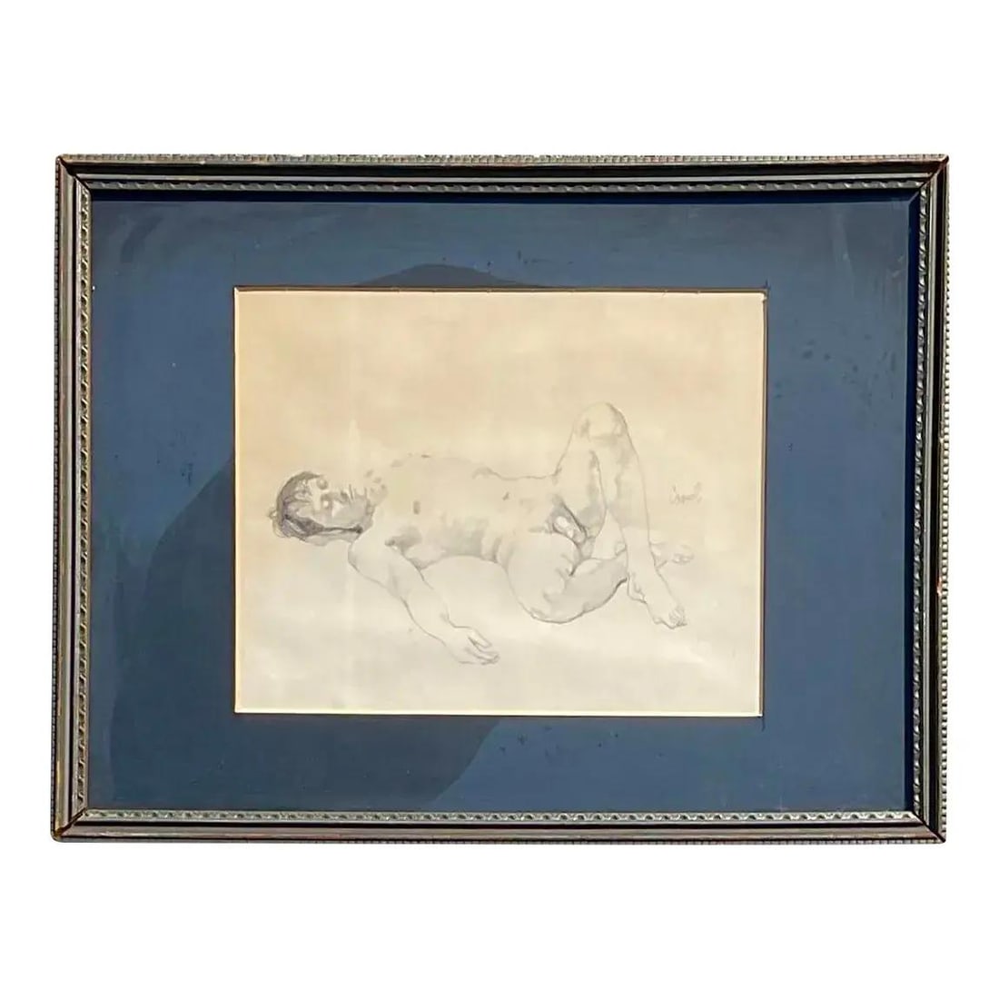Framed Reclining Figure Art Sketch on Canvas with Blue Matte: Framed Reclining Figure Art Sketch on Canvas with Blue Matte This vintage nude sketch on canvas features a delicate and artistic depiction of the human form in a reclining pose. Created with soft penc