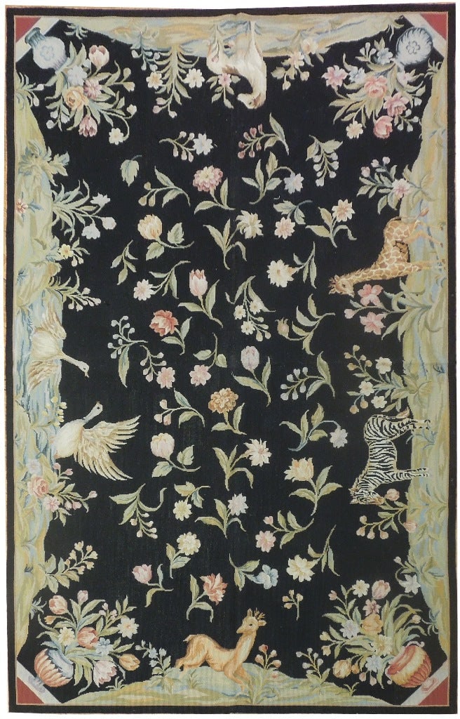 5' x 8' Black Hand-Knotted Needlepoint Flat Weave Area Rug: 5' x 8' Black Hand-Knotted Needlepoint Flat Weave Area Rug Free continental US Shipping Introducing the 5' x 8' Black Needlepoint Flat Weave Rug, a striking addition that seamlessly blends modern soph