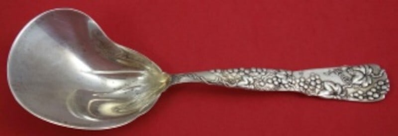 Tiffany & Co Vine Sterling Silver 9" Berry Spoon Conch Shape Grape Motif: Tiffany & Co Vine Sterling Silver 9" Berry Spoon Conch Shape Grape Motif This exquisite serving spoon from Tiffany & Co. features the elegant Vine pattern and is crafted from high-quality sterling sil