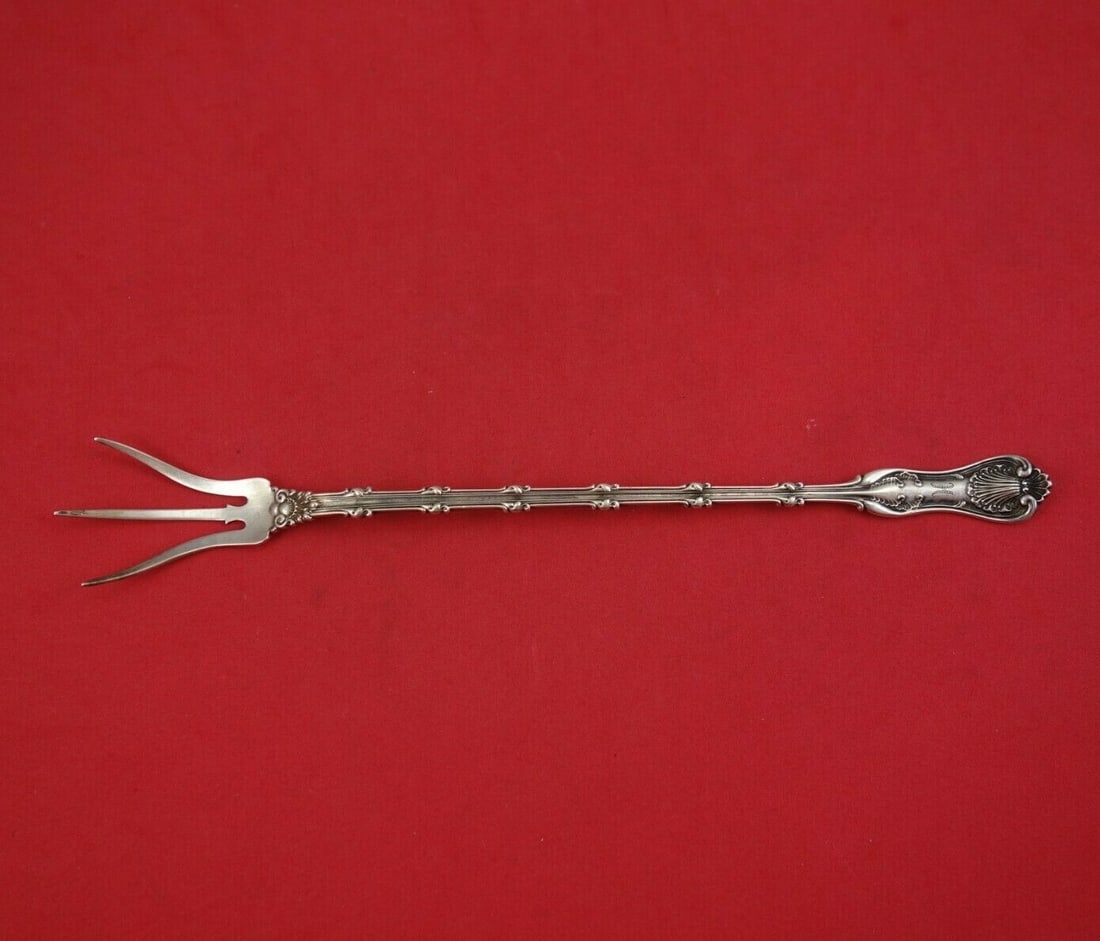 Whiting Imperial Queen Sterling Silver Antique Lettuce Fork 9 1/8": Whiting Imperial Queen Sterling Silver Antique Lettuce Fork 9 1/8" This exquisite serving fork features the Imperial Queen pattern by Whiting, crafted from high-quality sterling silver. Measuring 9 1/