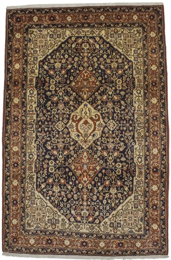 Hand-Knotted 6x9 Wool Oriental Rug with Vintage Floral Motif: Hand-Knotted 6x9 Wool Oriental Rug with Vintage Floral Motif This handmade vintage-style Oriental area rug features a floral design in dark navy, burnt orange, beige, and khaki tones. Crafted from woo