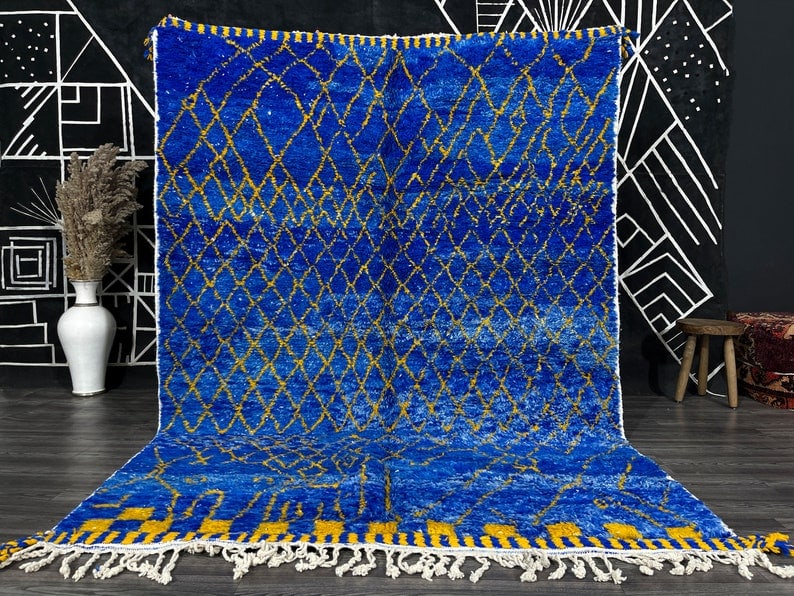 Authentic Blue Handwoven Rug from Morocco 100% Sheep Wool: Authentic Blue Handwoven Rug from Morocco 100% Sheep Wool Discover the beauty of this stunning authentic blue rug, handwoven in the Atlas Mountains by skilled local Berber women weavers. Crafted using