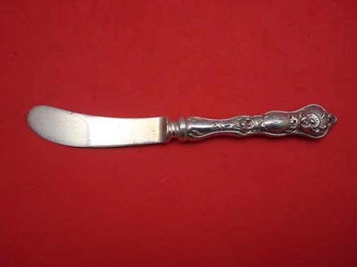 Fiorito Shiebler Sterling Silver Butter Spreader Hollow Handle 6 Inch: Fiorito Shiebler Sterling Silver Butter Spreader Hollow Handle 6 Inch This elegant butter spreader features a hollow handle crafted from sterling silver, designed in the beautiful Fiorito pattern by S