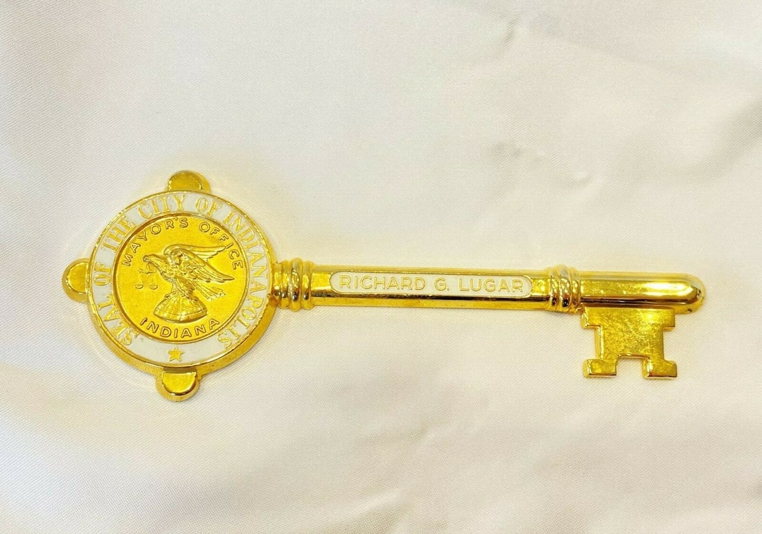 Gold Plated Key of Indianapolis Mayor's Office Enamel Collectible: Gold Plated Key of Indianapolis Mayor's Office Enamel Collectible This stunning key of the City of Indianapolis, presented by the Mayor, is crafted from gold-plated metal with intricate enamel detaili