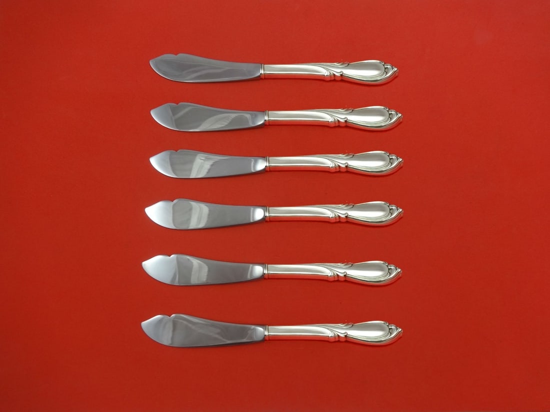 International Sterling Silver Rhapsody New 6pc Trout Knife Set 7.5in: International Sterling Silver Rhapsody New 6pc Trout Knife Set 7.5in This exquisite 6-piece trout knife set features the elegant Rhapsody New pattern by International Sterling. Crafted from sterling s